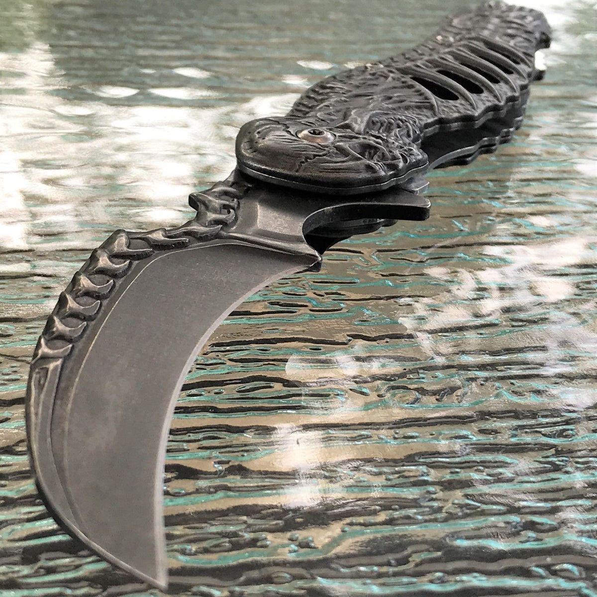 8.25 TAC FORCE SKULLS SPRING ASSISTED TACTICAL FOLDING KNIFE