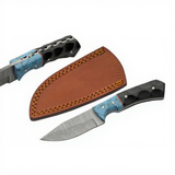 Damascus steel knife with blue turquoise and black Micarta handle, accompanied by a brown leather sheath on a white background.