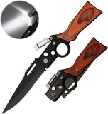 Folding knife with wooden handle and metal blade on a white background