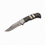 Folding knife with a decorative handle on a white background