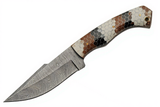 Damascus steel Texas Rattler knife with a acrylic snakeskin honeycomb pattern handle on a white background