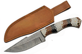 Texas Damascus Steel fixed blade knife with twist and wavy pattern blade and rattlesnake snakeskin acrylic handle, accompanied by a brown leather sheath on a white background.