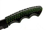 Damascus knife with green and black patterned handle on a white background