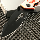 "Scorpion Sting" text on pocket knife's blade
