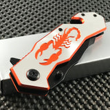 Pocket knife featuring orange scorpion design