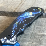Pocket knife handle highlighting a blue dragon and skulls design