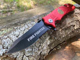  Fire Dept rescue knife open showing black serrated blade and red aluminum handle with firefighter emblem