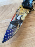 Folding knife with an eagle and American flag design on a wooden surface