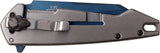 Tac-Force TF-951BL folding tactical pocket knife closed showing the tip-down stainless steel pocket clip and detailed skull emblem handle layout.
