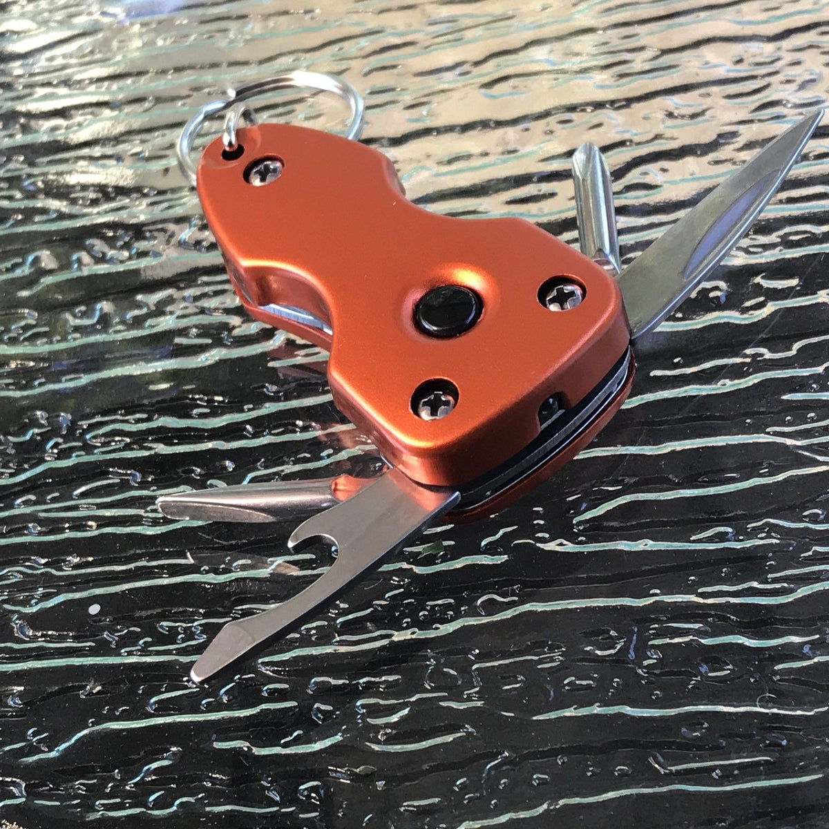 Multi Tool Pin Mini Multi-Tool with Screwdriver, Bottle Opener, LED Light, & Keychain
